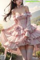 a woman in a pink dress and stockings posing for a picture